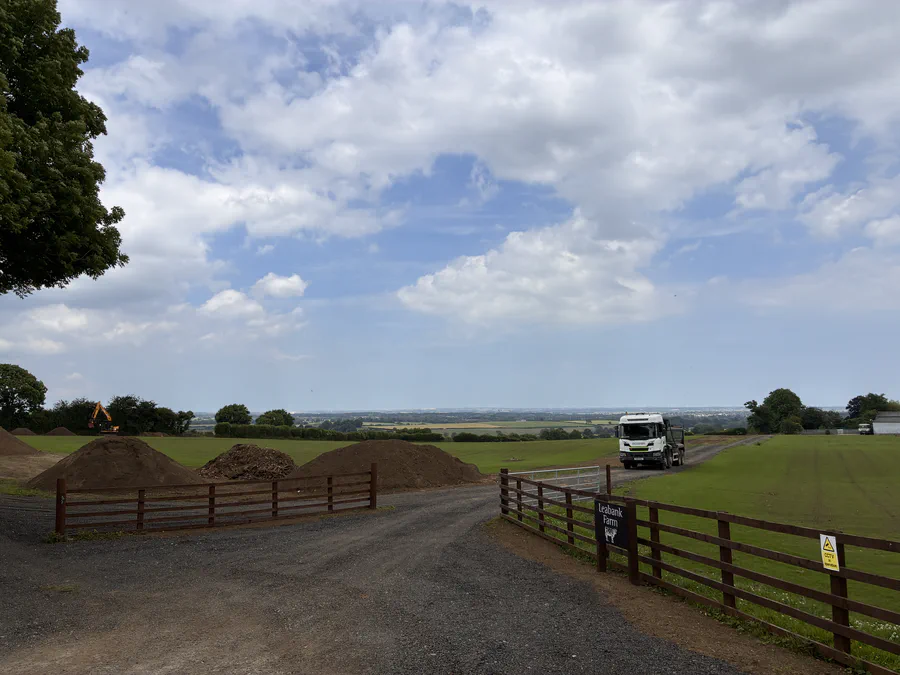 Broad farmland beneath a cloudy sky near Redworth Hall in County Durham
