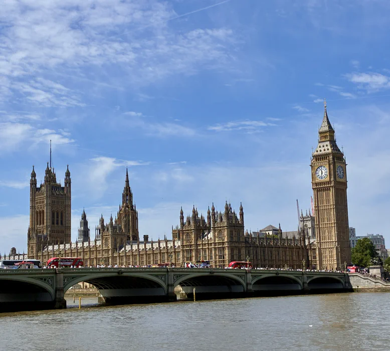 The Palace of Westminster, Elizabeth Tower, and Westminster Bridge seen across the River Thames