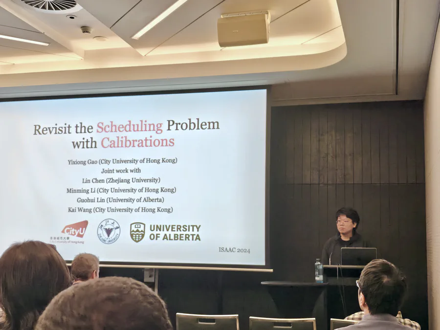 Yixiong Gao presenting Revisit the Scheduling Problem with Calibrations at ISAAC 2024