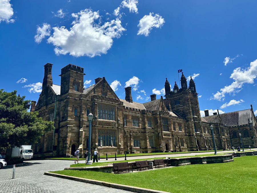 The University of Sydney Quadrangle beneath a bright blue sky