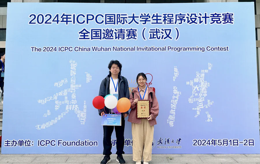 Team HDU-Eva holding their gold award at the 2024 ICPC Wuhan Invitational